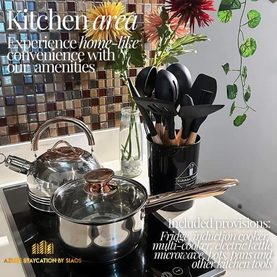 Fully equipped kitchen with complete cookware and dining ware