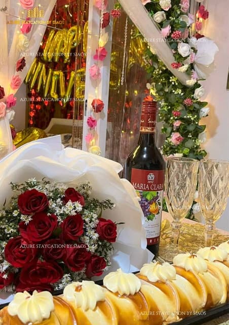 Toasting wine and flowers set up for an anniversary celebration