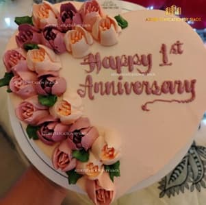 Heart-shaped custom anniversary cake for an Azure Staycation celebration